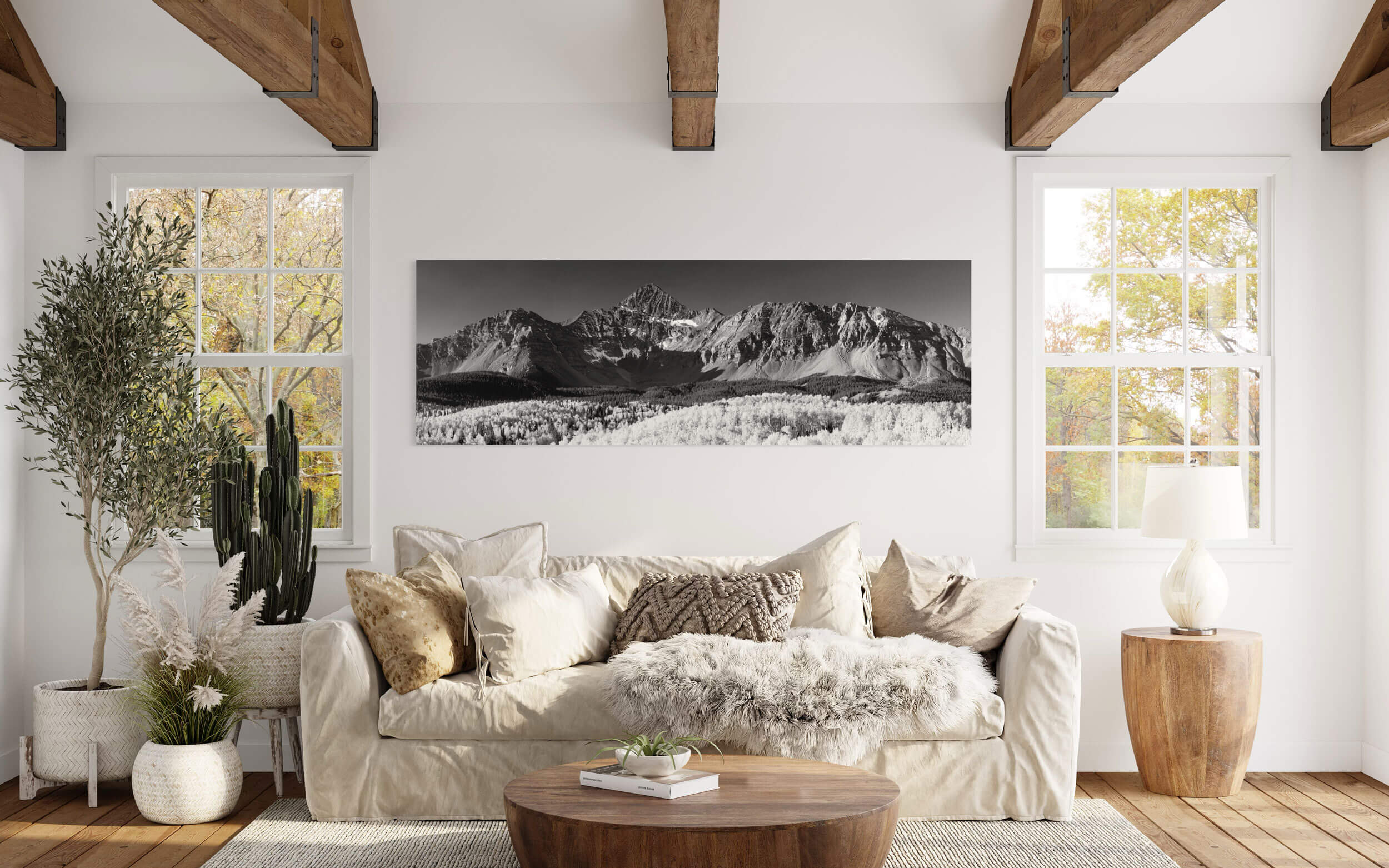 A black and white Mount Wilson picture near Telluride, Colorado hangs in a living room.