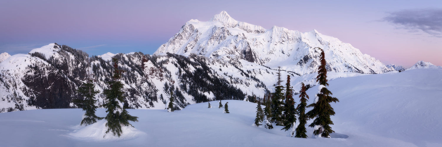 An Artist Point snowshoe picture shows Mount Shuksan at sunset.