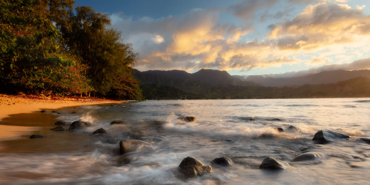 A Hanalei Bay pictures capturing a beautiful beach sunset.