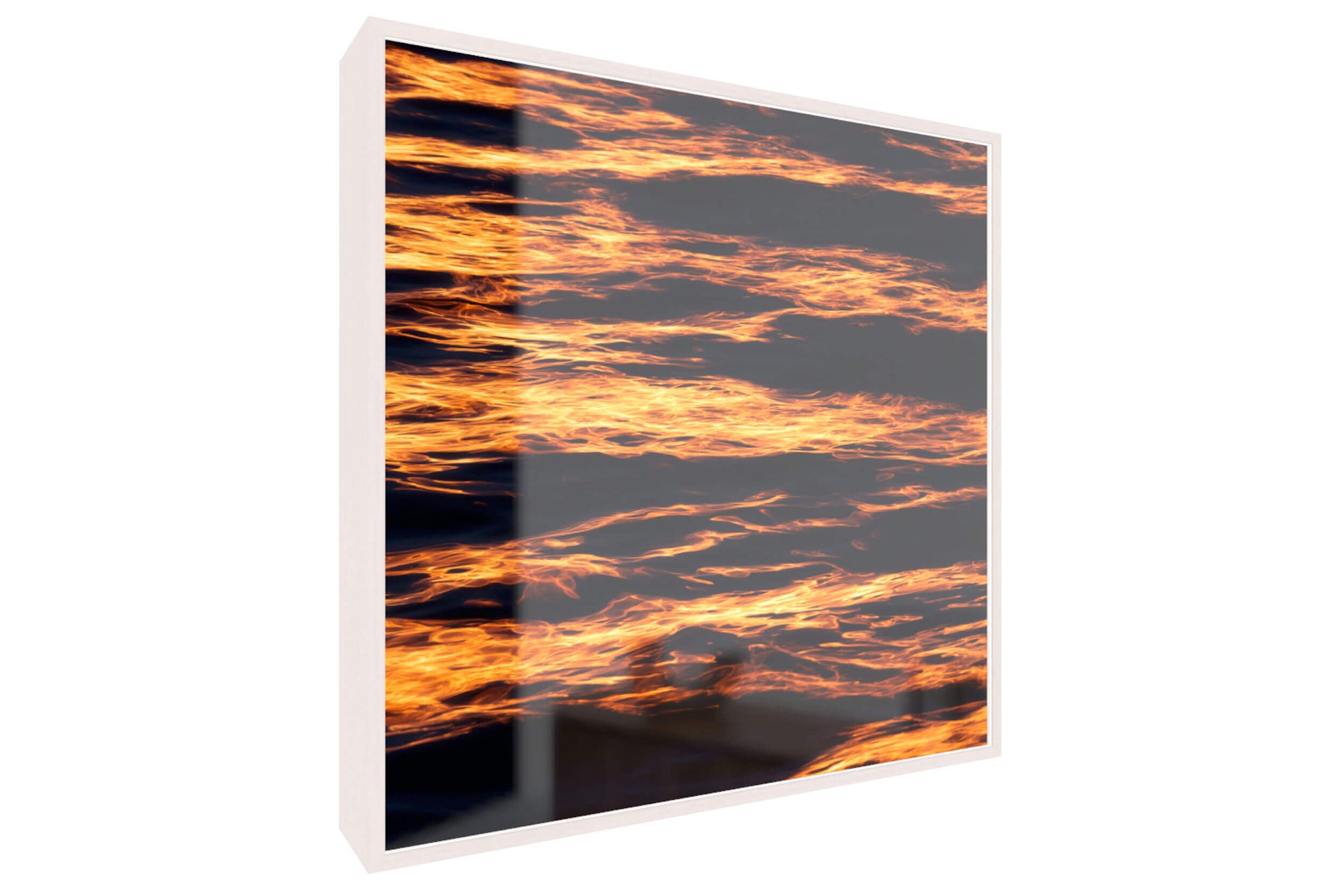 A framed Alki Beach sunset picture.