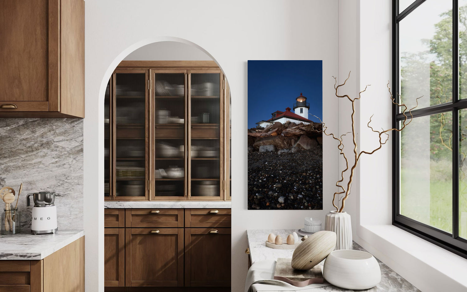 A piece of West Seattle wall art showing the Alki Lighthouse hangs in a kitchen.