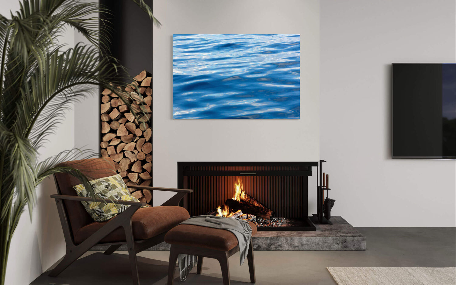 A piece of abstract water art showing a picture from an Anacortes whale watching tour hangs in a living room.