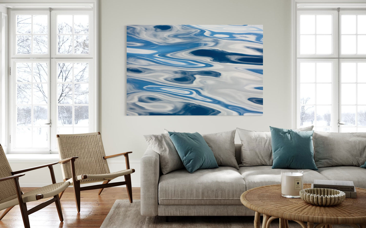 A piece of Anacortes art showing the abstract water surface on a whale watching tour hangs in a living room.