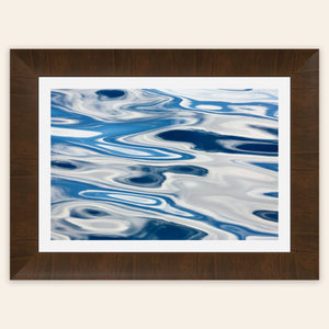 A piece of framed Anacortes art shows the abstract water surface on a whale watching tour.