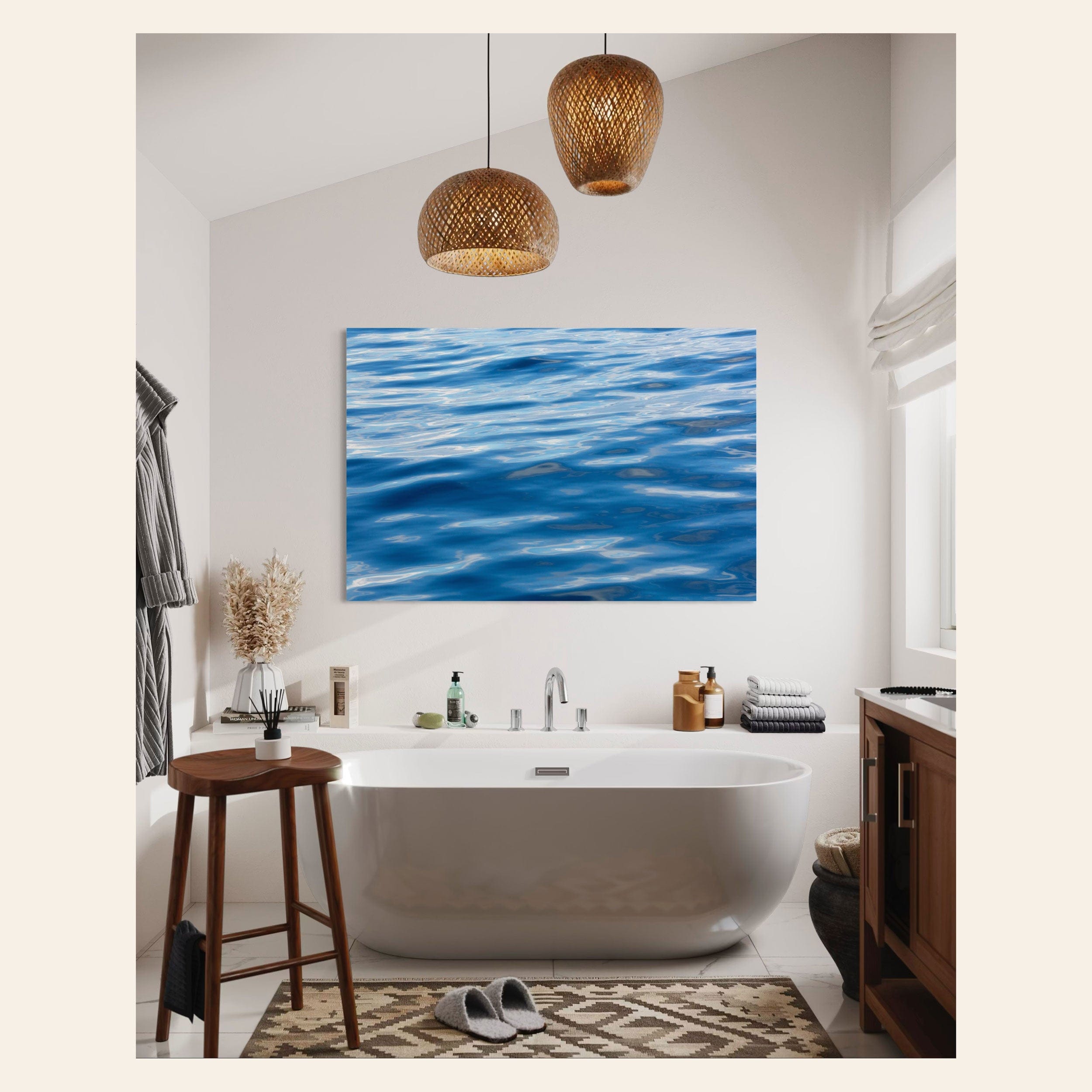 A piece of Anacortes art showing a photo of the water, as seen from aboard a whale watching boat tour, hangs in a bathroom.