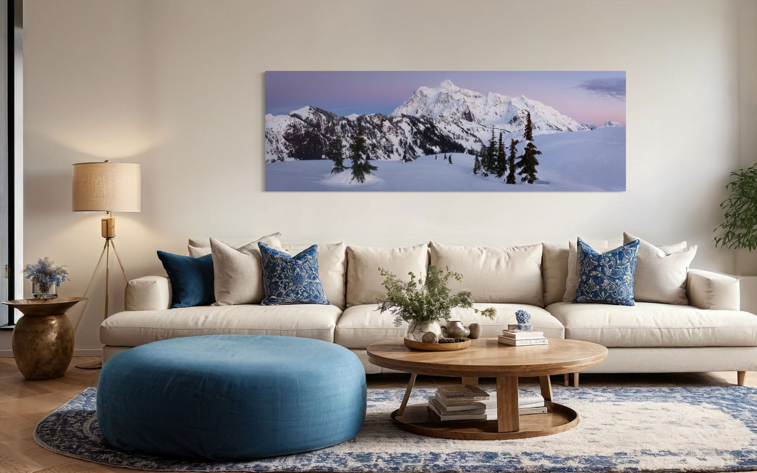 A piece of Washington wall art showing the view from Artist Point at Mount Baker toward Mount Shuksan hangs in a living room.