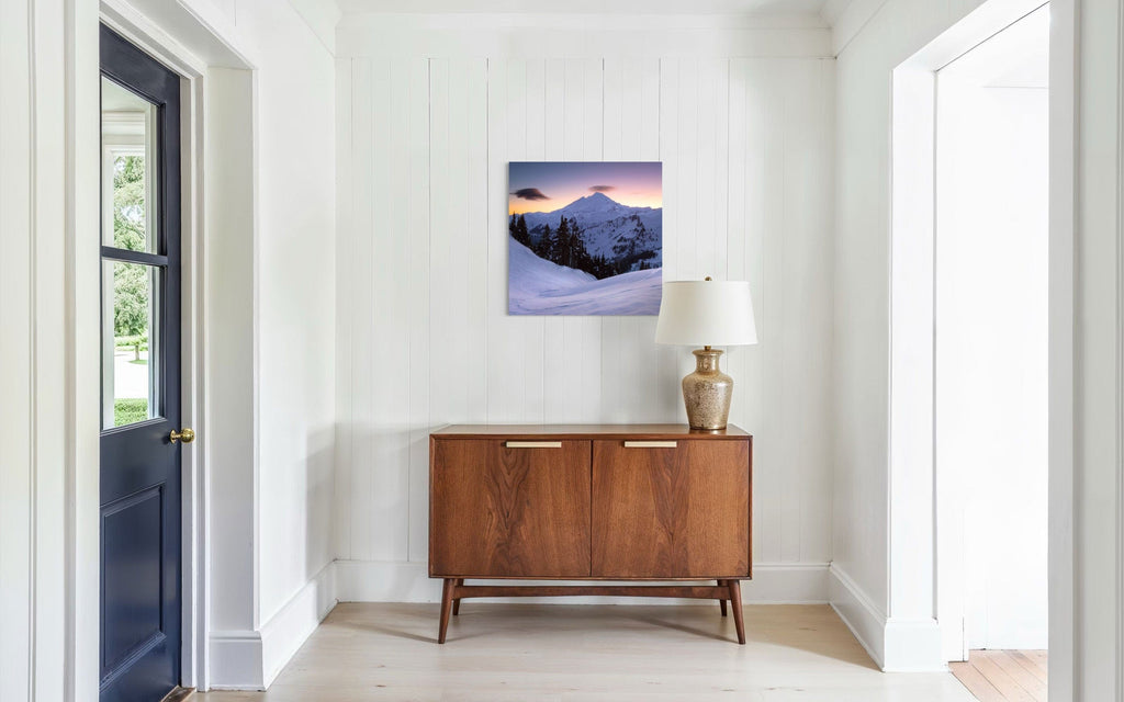 A piece of Pacific Northwest art showing a Mount Baker photo hangs in an entryway.