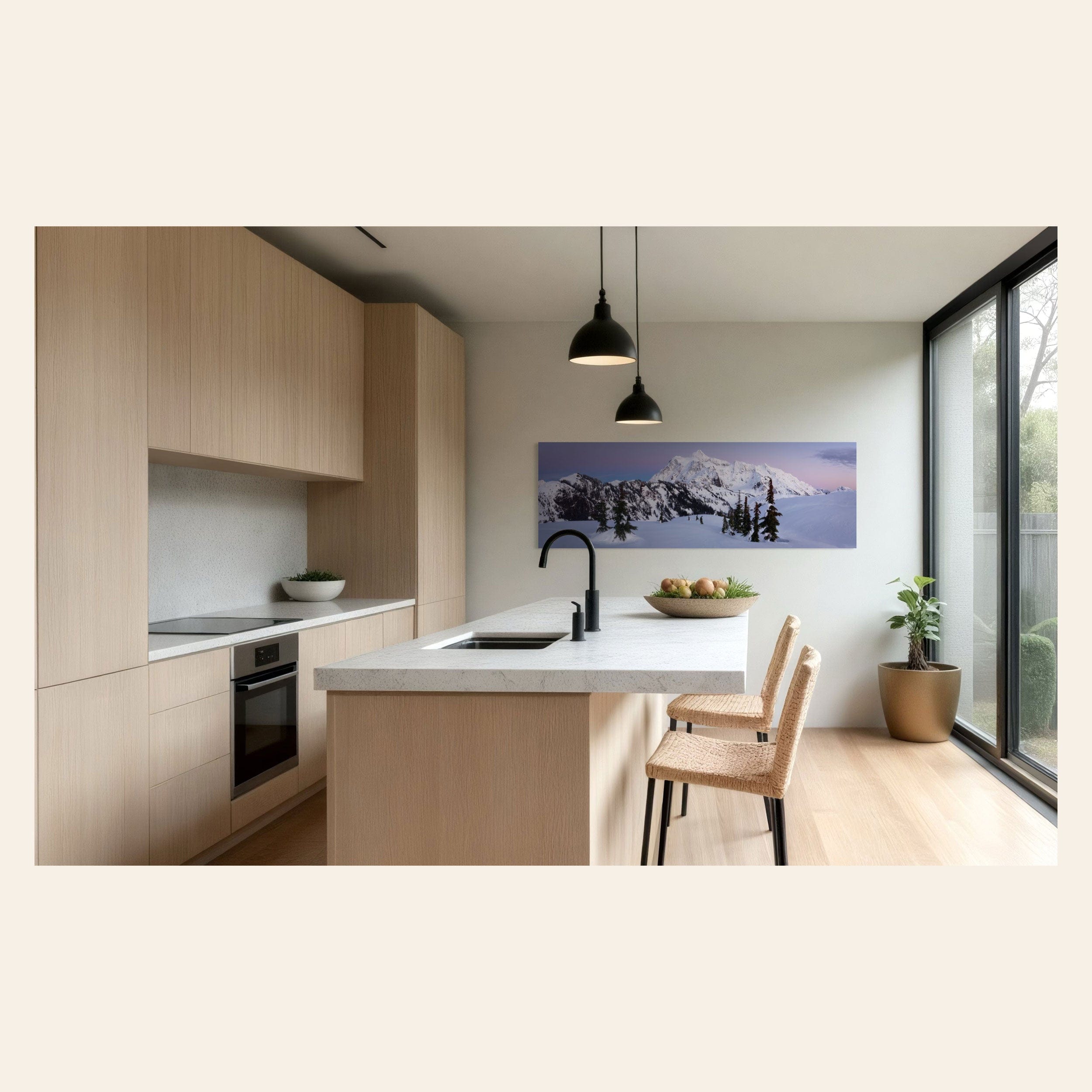 A piece of Washington wall art showing the view from Artist Point at Mount Baker toward Mount Shuksan hangs in a kitchen.