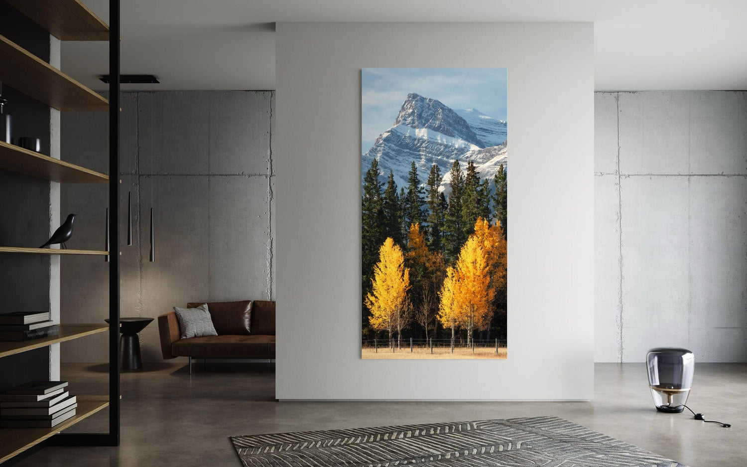 A piece of Banff wall art showing fall color photography hangs in a living room.