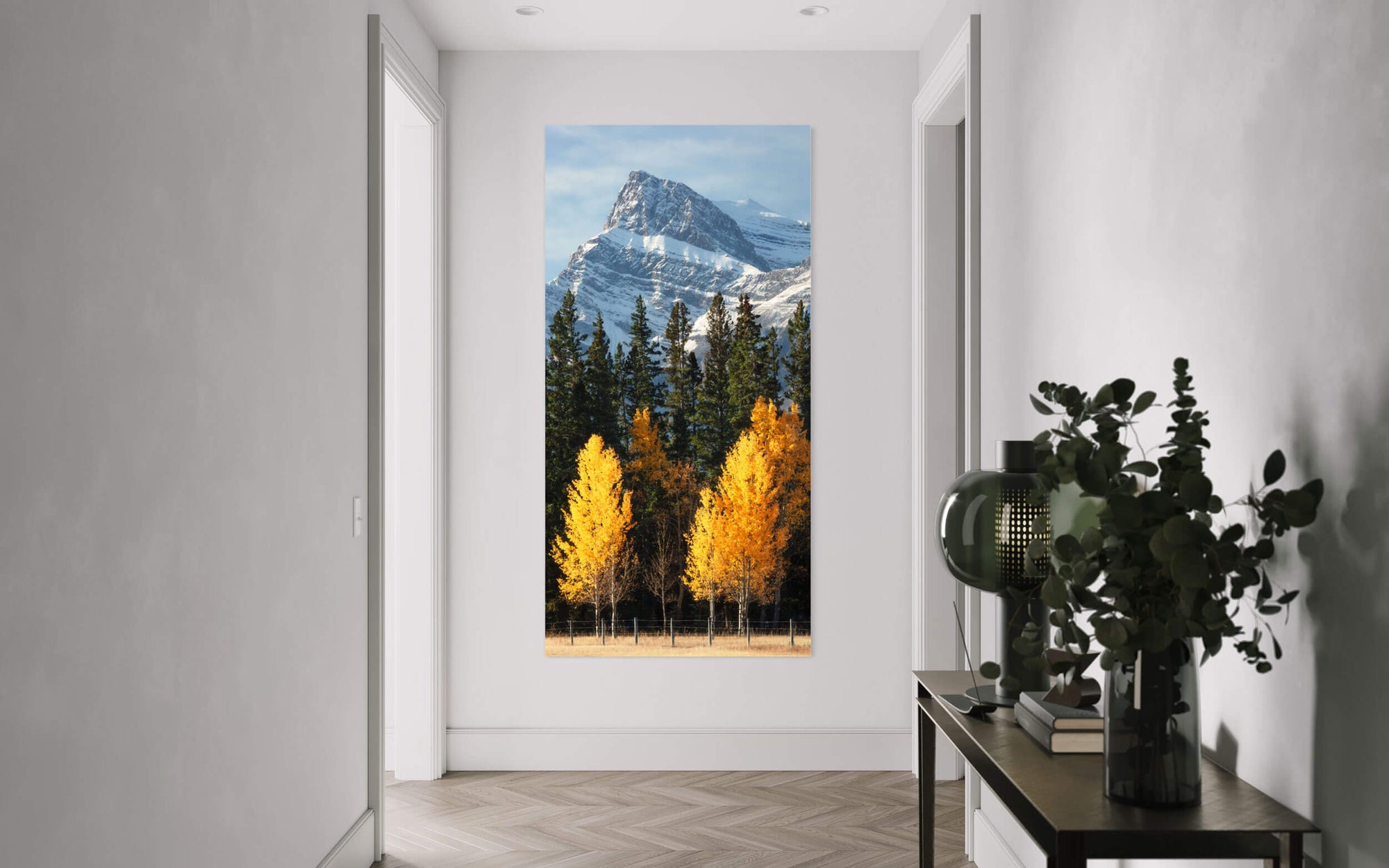 A picture of the Banff fall colors hangs in a hallway.