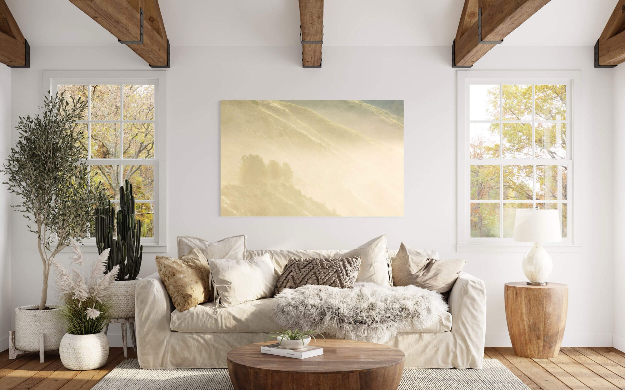 A Big Sur picture from the California coast hangs in a living room.