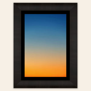 This framed piece of Big Sur Wall Art showcases a sunset photo.