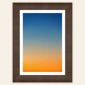 This framed piece of Big Sur Wall Art showcases a sunset photo.