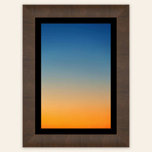 This framed piece of Big Sur Wall Art showcases a sunset photo.