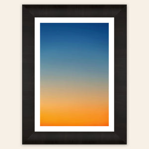 This framed piece of Big Sur Wall Art showcases a sunset photo.