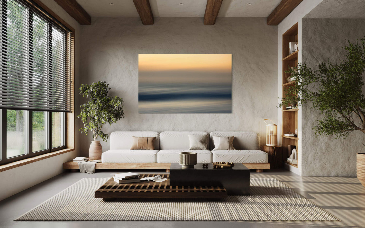 An abstract sunset picture photographed in Big Sur, California, hangs in a living room.