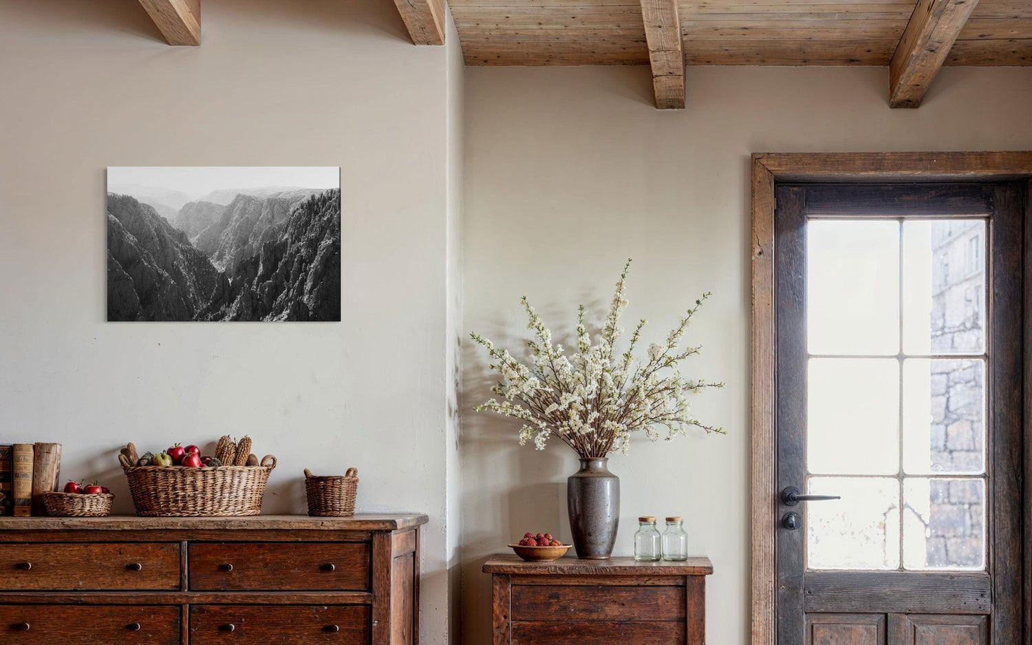 A piece of Colorado art showing a photo of the Black Canyon National Park in Gunnison hangs in an entryway.