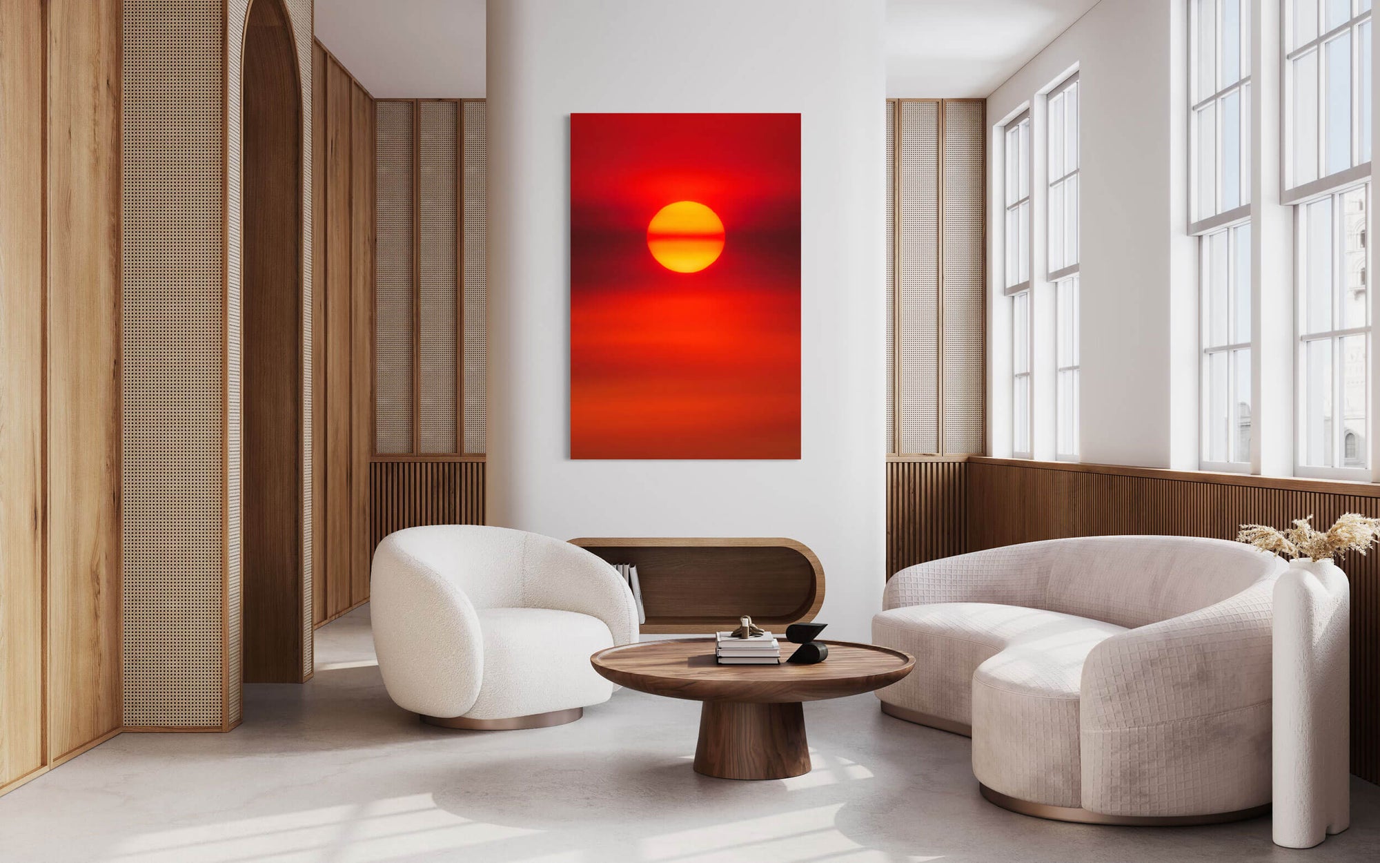 A sunrise picture photographed in Boulder, Colorado, hangs in a living room.