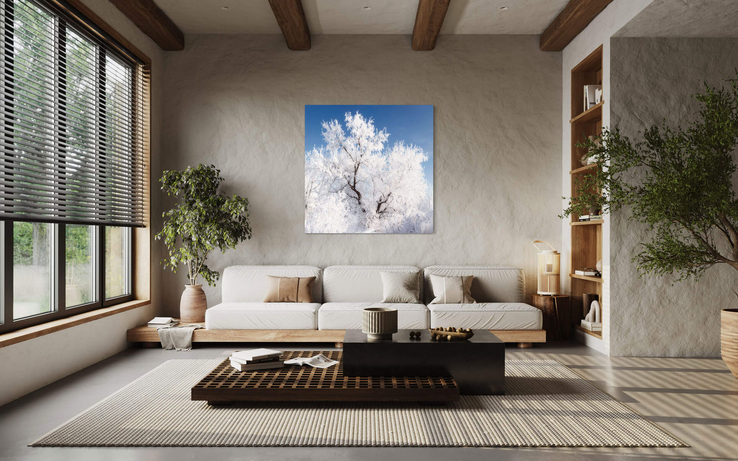 A piece of Boulder art showing a frozen tree in Colorado hangs in a living room.