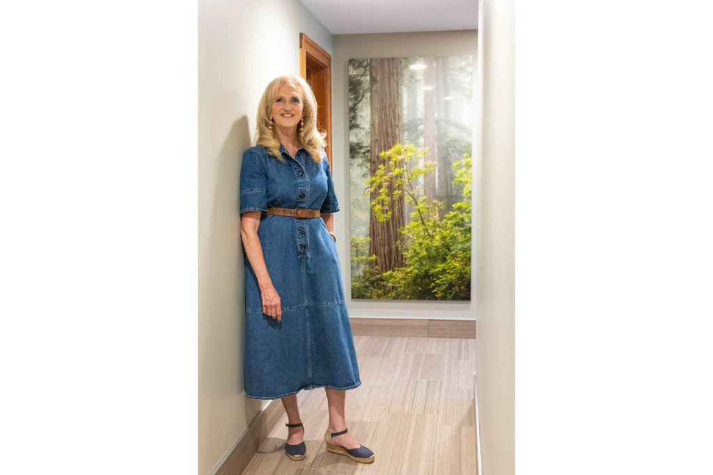 A Lars Gesing fine art collector with his California redwoods rhododendron photo in her home.