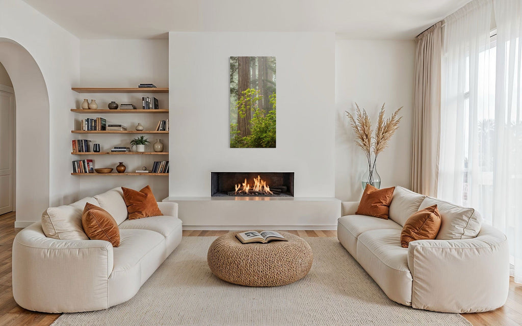 A piece of large wall art shows a California Redwoods photo hanging in a minimalist living room.