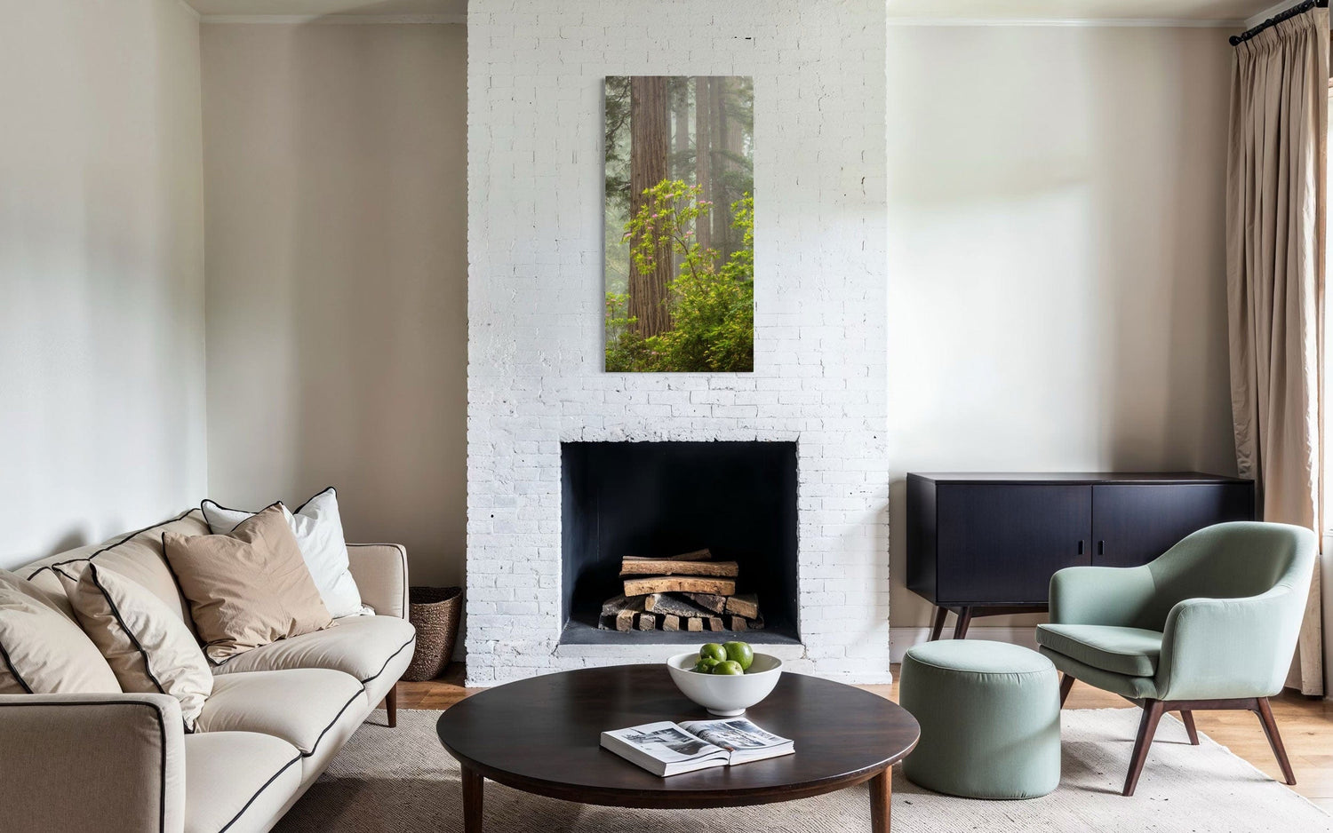A piece of large wall art shows a California Redwoods photo hanging above the fireplace.