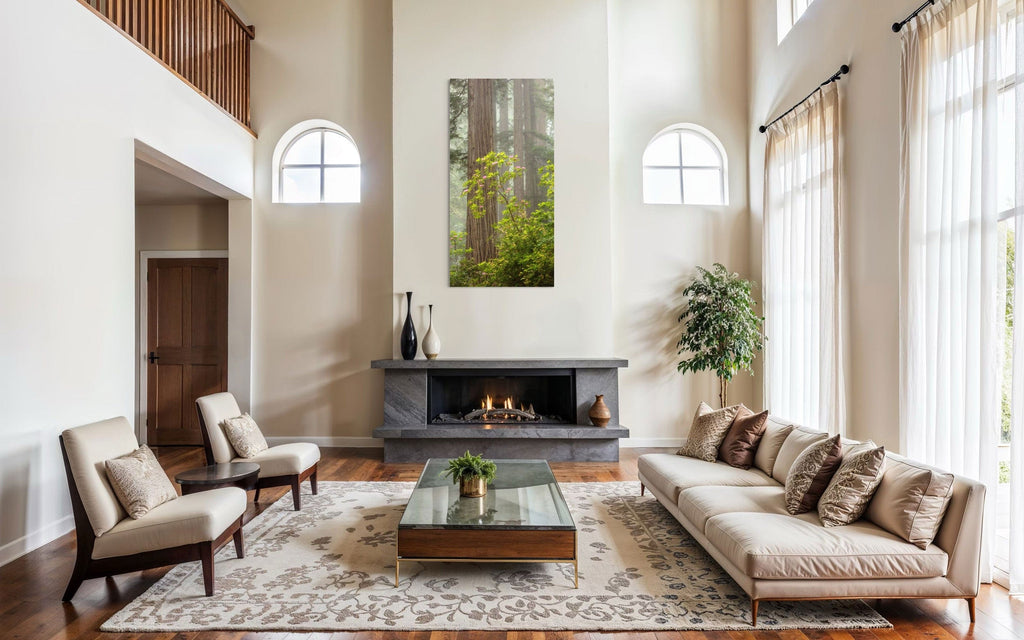 A piece of large wall art shows a California Redwoods photo hanging over a fireplace.