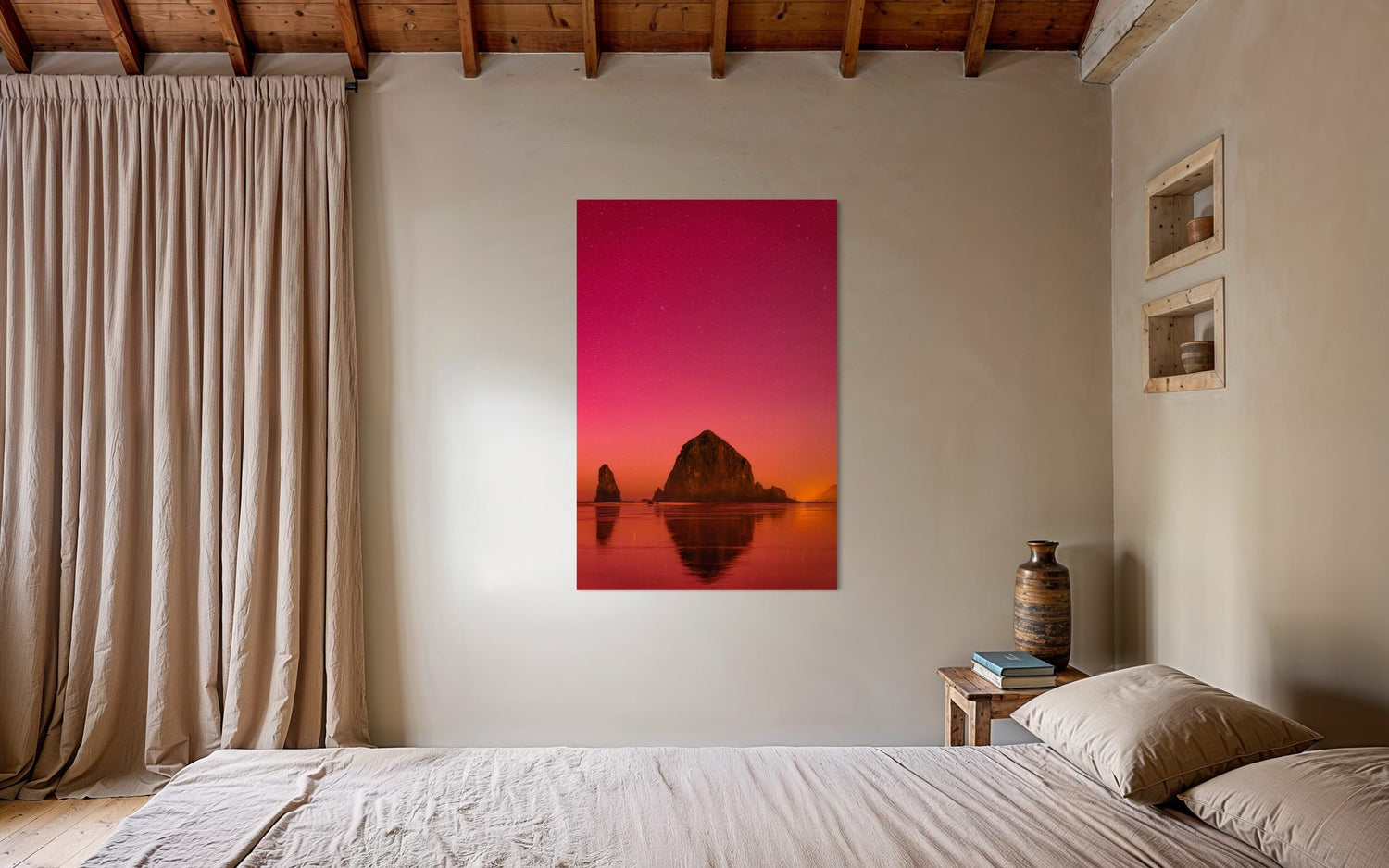 A photo of the Northern Lights in Cannon Beach hangs in a bedroom. | Lars Gesing Fine Art | Coastal Wall Art