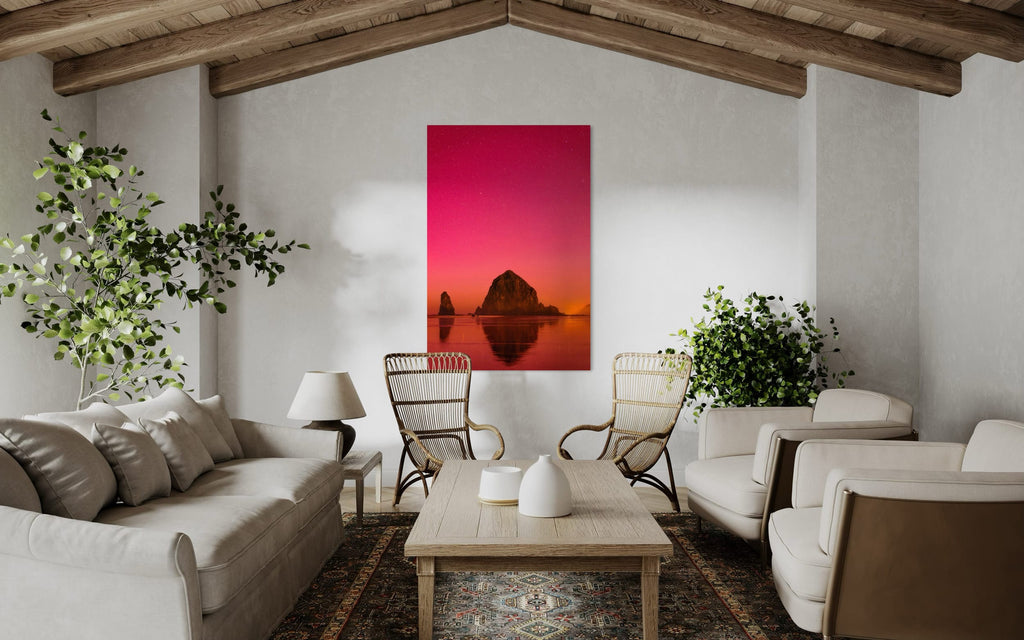 A photo of the Northern Lights in Cannon Beach hangs in a living room. | Lars Gesing Fine Art | Coastal Wall Art