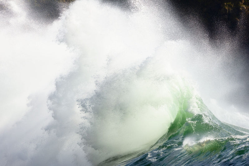 This piece of wave art shows a photo of Cape Disappointment on the Washington coast.