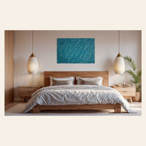 An abstract ocean photo hangs in a serene bedroom. | Lars Gesing Fine Art | Coastal Wall Art