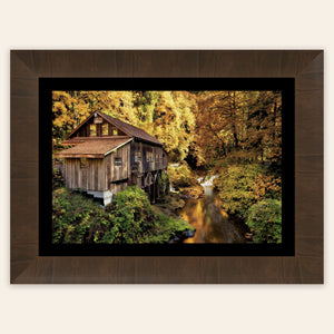 A piece of framed Washington art shows the Cedar Grist Mill near Woodland.