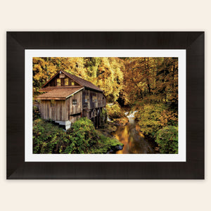 A piece of framed Washington art shows the Cedar Grist Mill near Woodland.