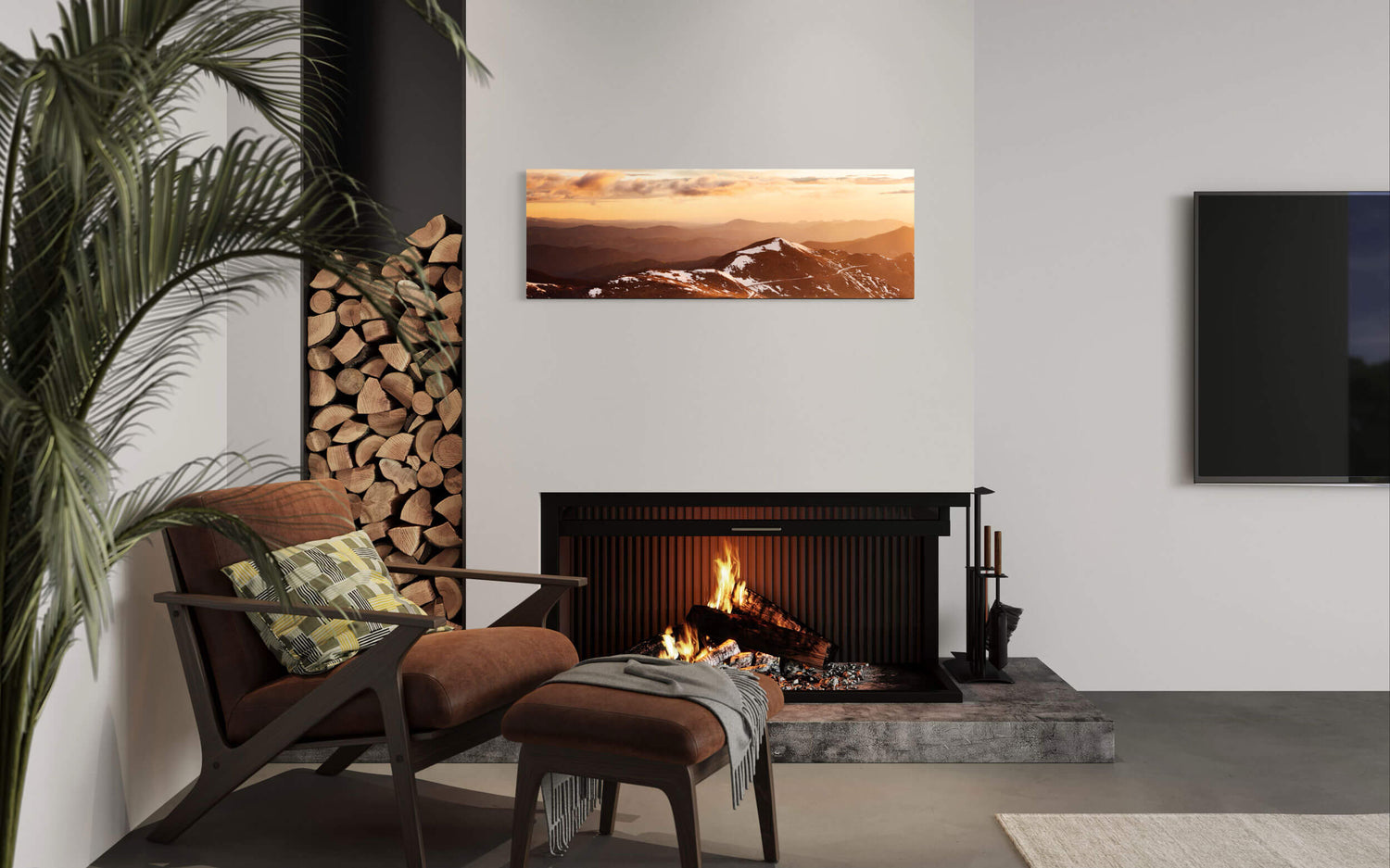 A piece of Colorado art showing a sunrise from Mount Evans looking toward Denver hangs in a living room.