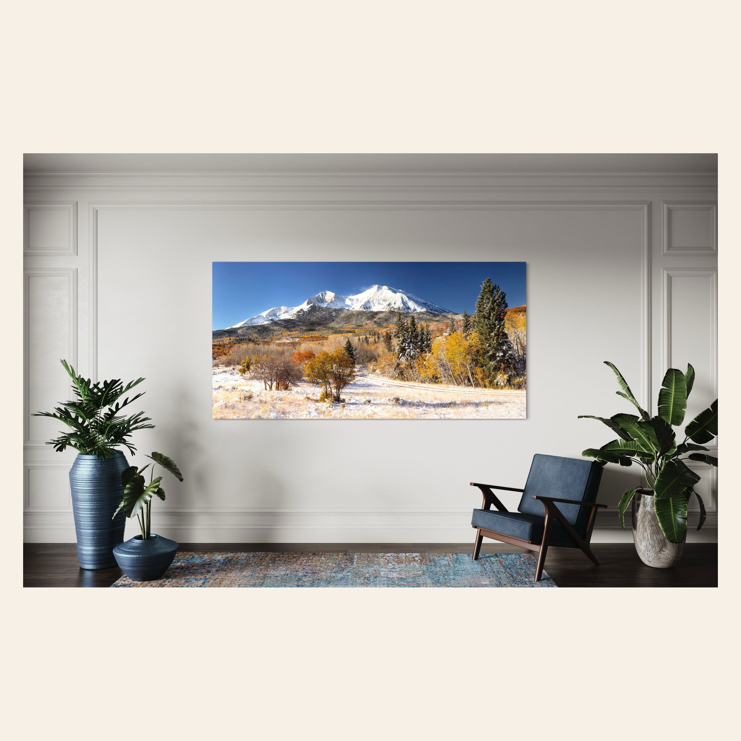 This piece of Colorado wall art showing a Mount Sopris photo hangs in a living room.