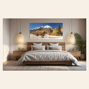 This piece of Colorado wall art showing a Mount Sopris photo hangs in a bedroom.