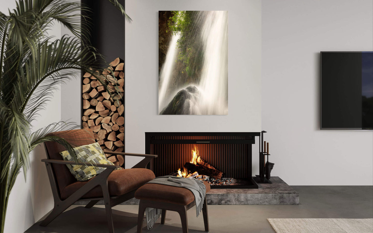 A piece of Colorado art showing the waterfall at Rifle Falls State Park hangs in a living room.