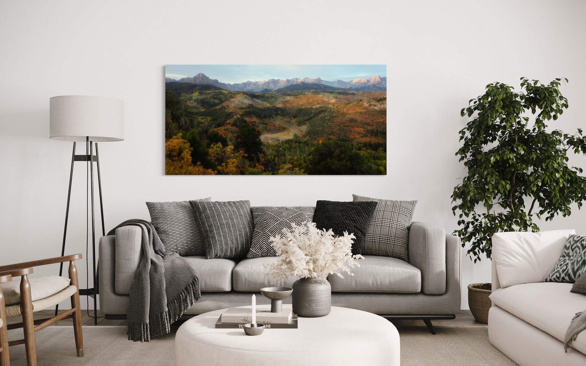 A Colorado fall picture of Mount Sneffels near Ridgway hangs in a living room.