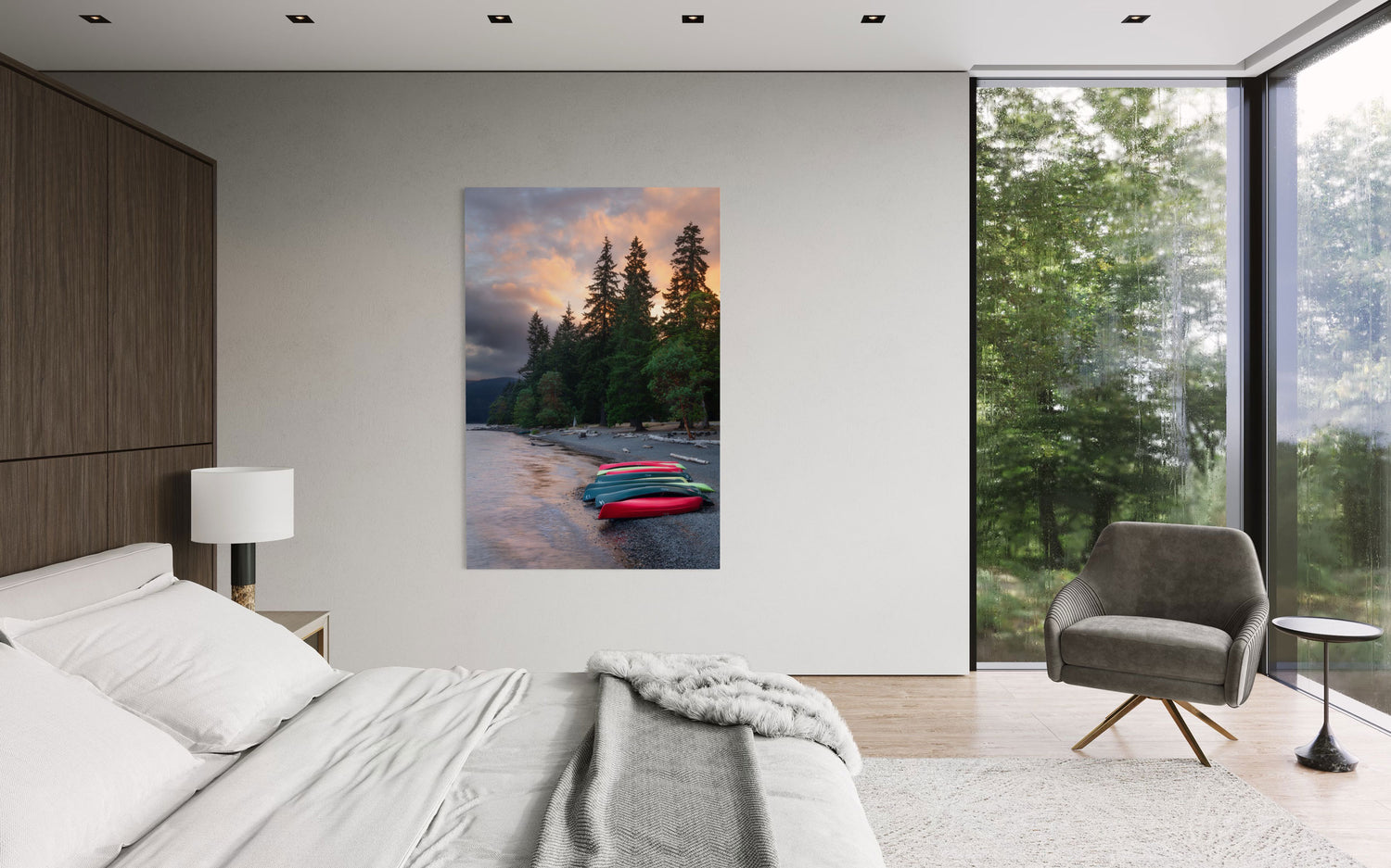 A piece of Washington art showing a Lake Crescent photo hangs in a bedroom.