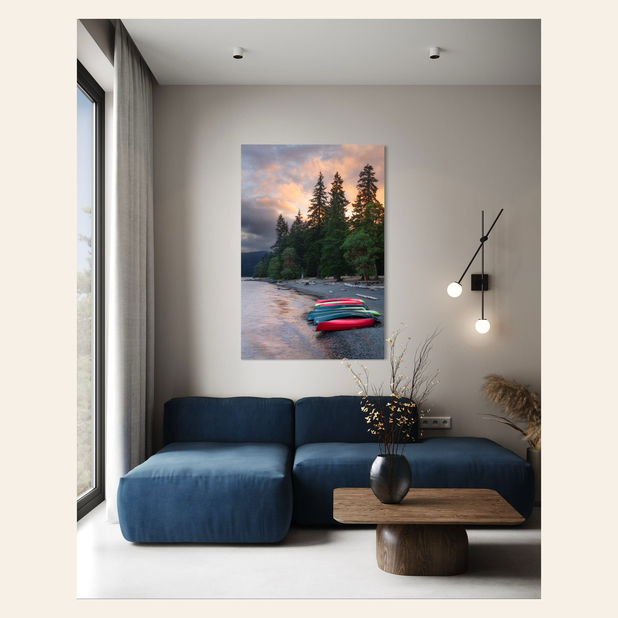 A piece of Washington art showing a Lake Crescent photo hangs in a living room.