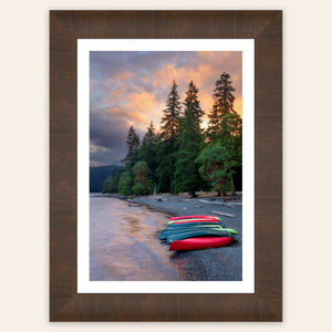 A piece of framed Washington art shows a Lake Crescent photo.