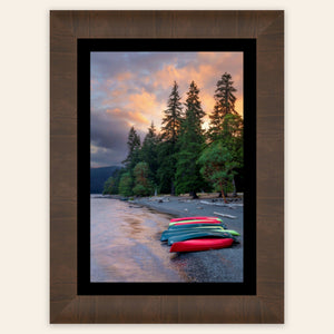 A piece of framed Washington art shows a Lake Crescent photo.