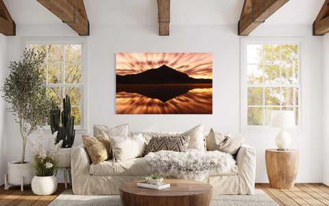 This piece of Crested Butte art showing a sunrise picture from Peanut Lake hangs in a living room.
