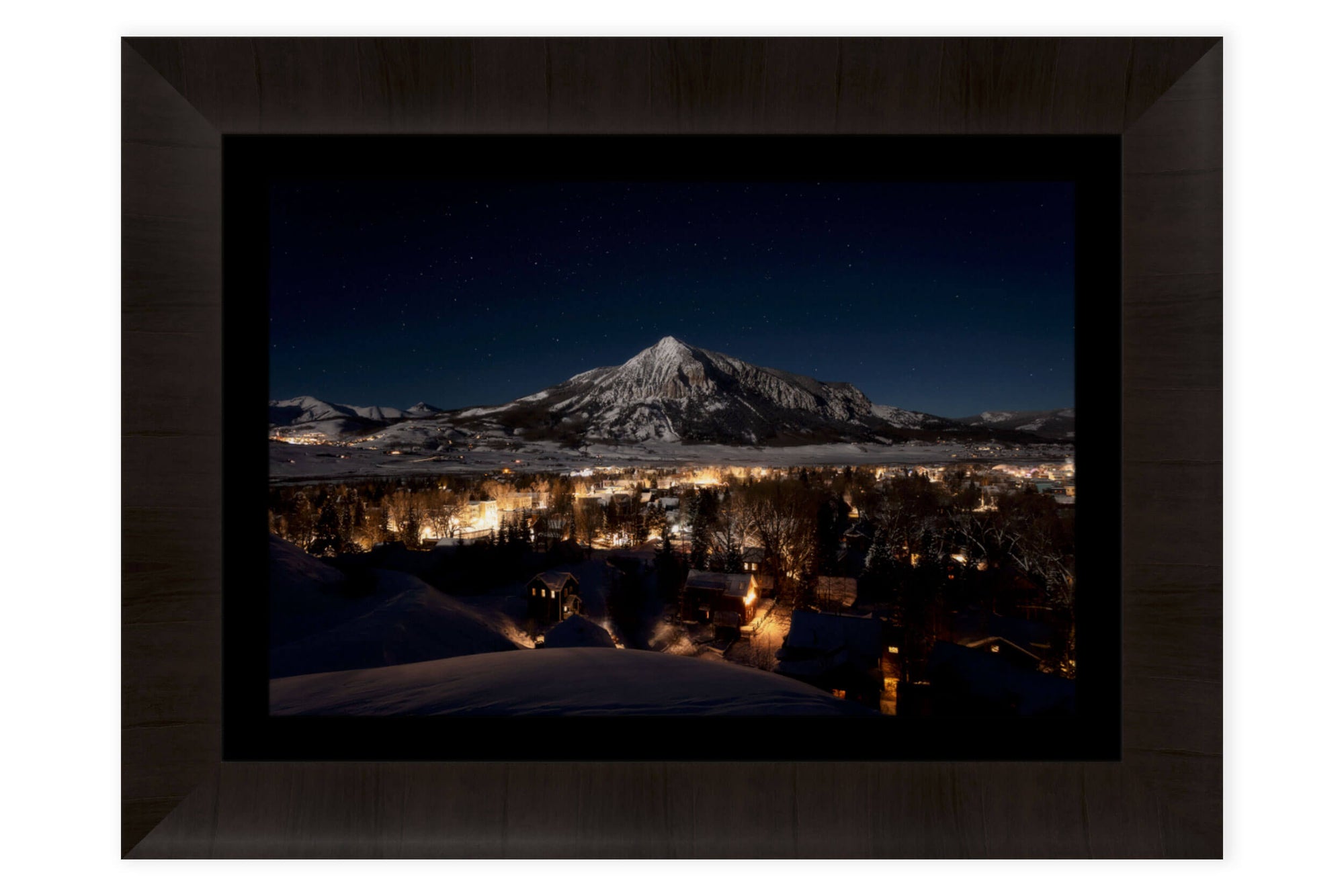 This framed Crested Butte picture shows the Colorado mountain town at night.