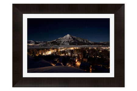 This framed Crested Butte picture shows the Colorado mountain town at night.