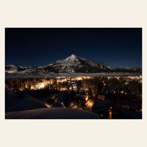 A piece of Crested Butte art shows this Colorado mountain town at night.