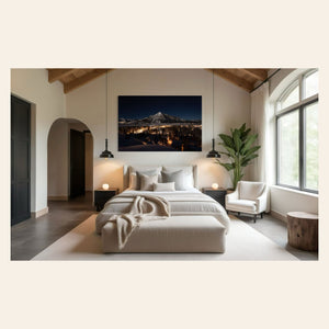 A piece of Crested Butte art showing the Colorado mountain town at night hangs in a bedroom.