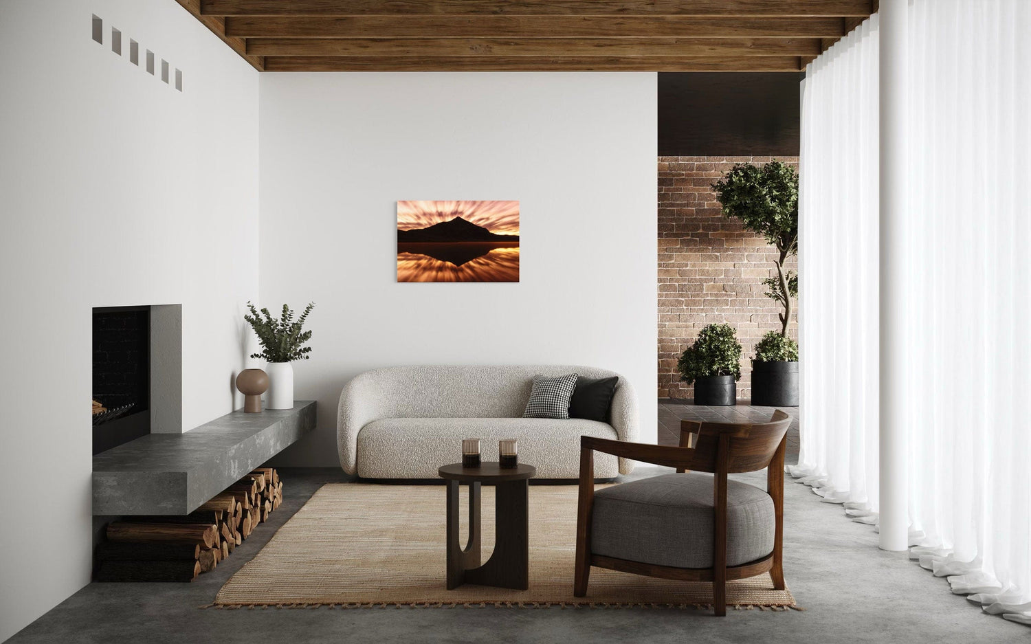 A piece of Crested Butte art showing a photo of the mountain at sunrise from Peanut Lake hangs in a modern rustic living room.