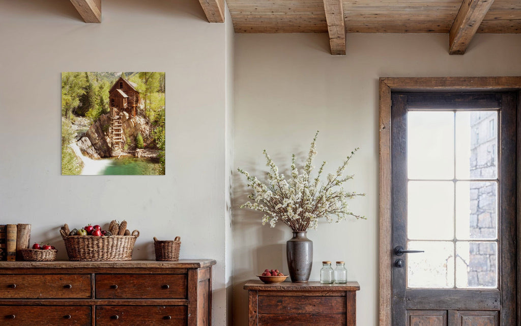 A piece of Colorado art showing a Crystal Mill photo hangs in an entryway.