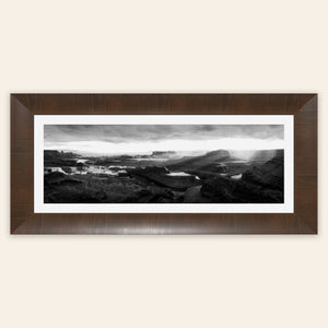 A framed piece of black and white panorama wall art from Dead Horse Point in Utah.